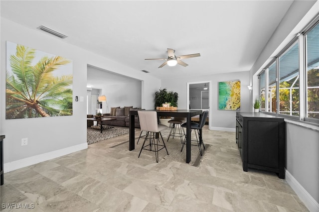 dining room with ceiling fan