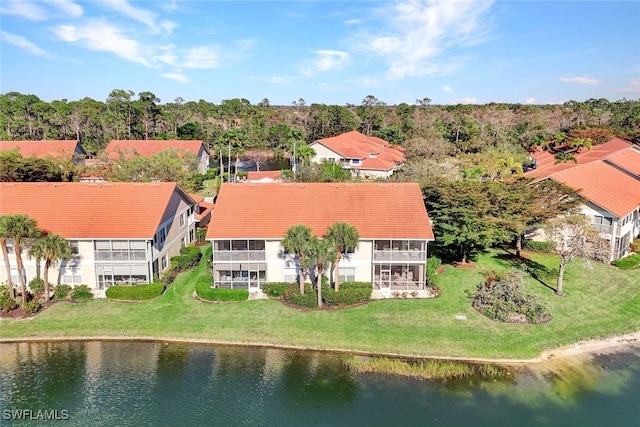 bird's eye view with a water view