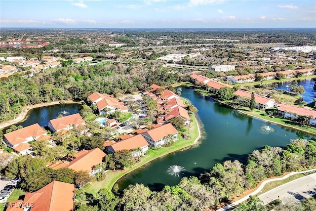 aerial view featuring a residential view and a water view