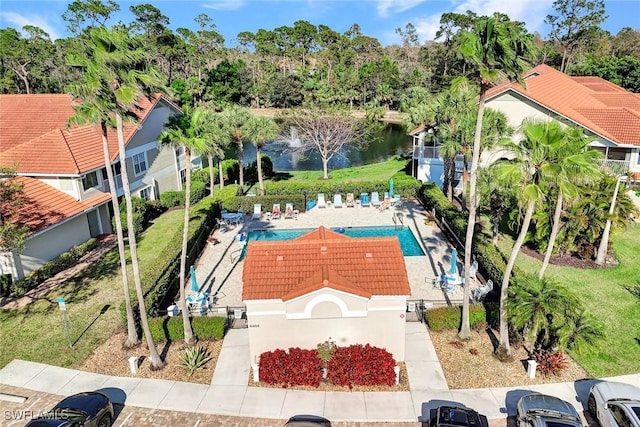 birds eye view of property featuring a water view