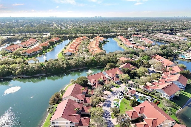 bird's eye view with a water view and a residential view