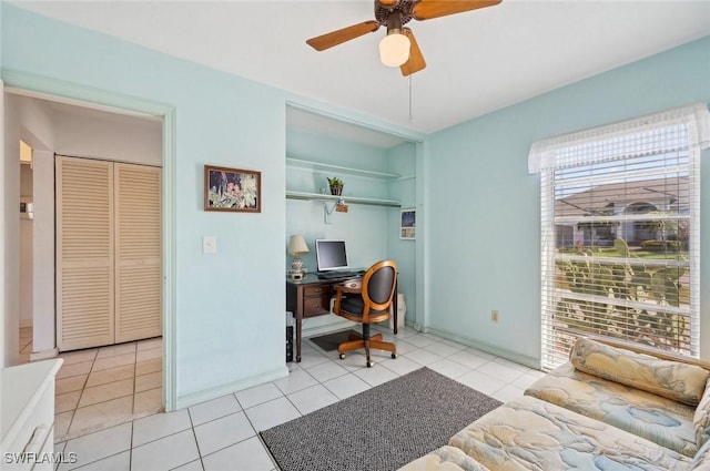 office featuring ceiling fan and light tile patterned floors