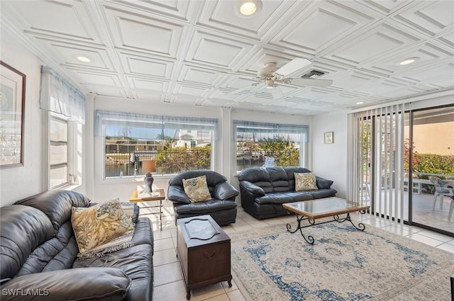 sunroom featuring ceiling fan