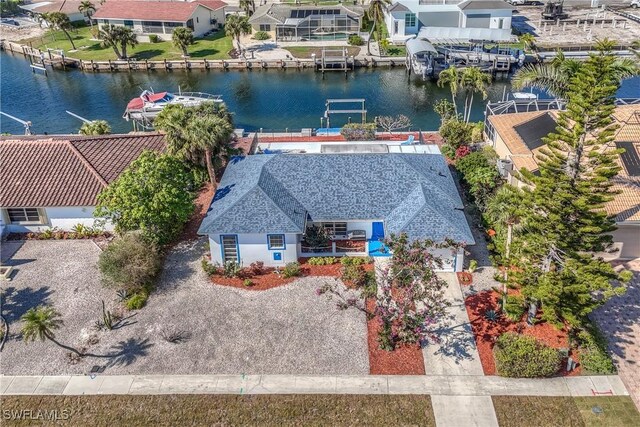 drone / aerial view featuring a water view