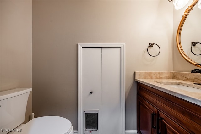 2534 Verdmont Ct, Cape Coral, FL 33991 - half bathroom with vanity and toilet