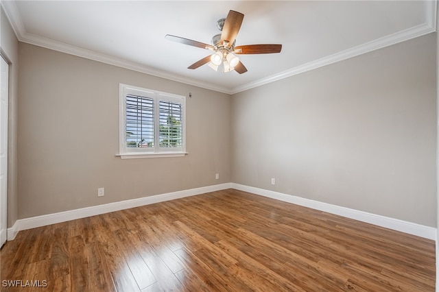 2534 Verdmont Ct, Cape Coral, FL 33991 - empty room with crown molding, ceiling fan, wood finished floors, and baseboards