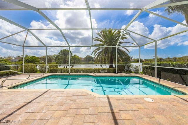 2534 Verdmont Ct, Cape Coral, FL 33991 - outdoor pool with a lanai, a water view, and a patio
