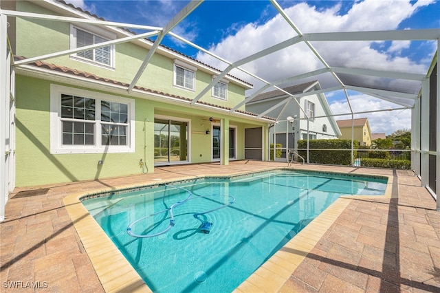 2534 Verdmont Ct, Cape Coral, FL 33991 - pool featuring a ceiling fan, a lanai, and a patio area
