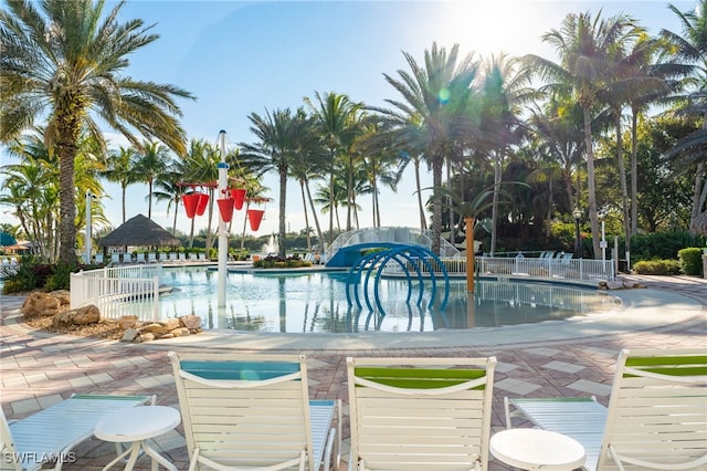 2534 Verdmont Ct, Cape Coral, FL 33991 - community pool featuring fence, a water play area, and a patio