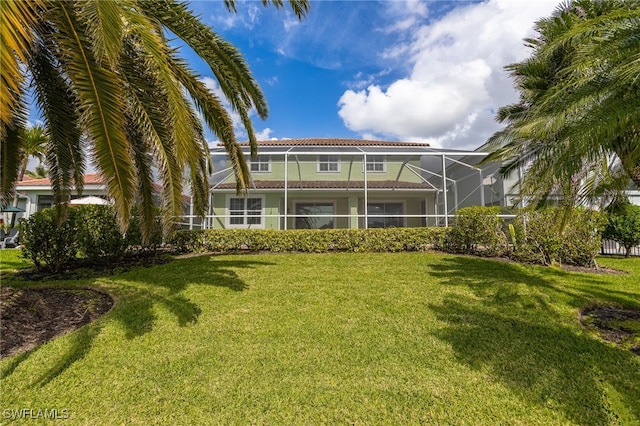 2534 Verdmont Ct, Cape Coral, FL 33991 - rear view of property with a lanai and a lawn