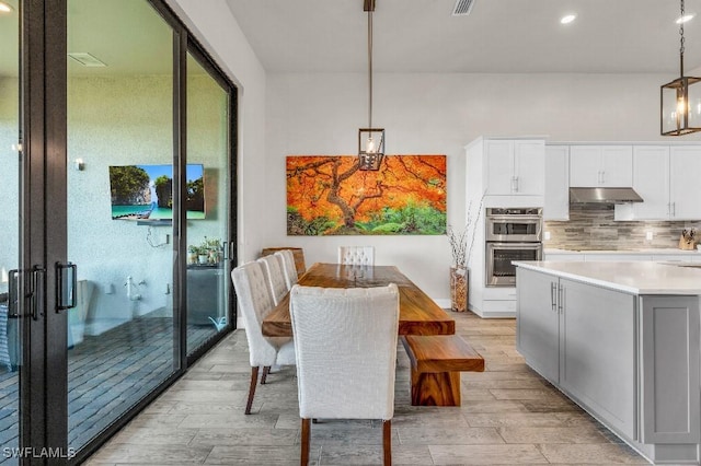 dining room featuring light hardwood / wood-style flooring