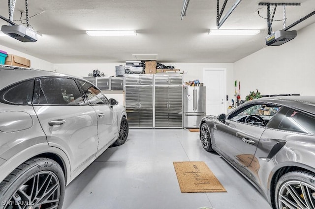 garage featuring high quality fridge and a garage door opener