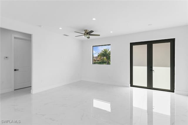 unfurnished room featuring ceiling fan