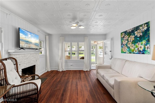 3475 Edgewood Ave, Fort Myers, FL 33916 - living room with dark hardwood / wood-style floors and a brick fireplace