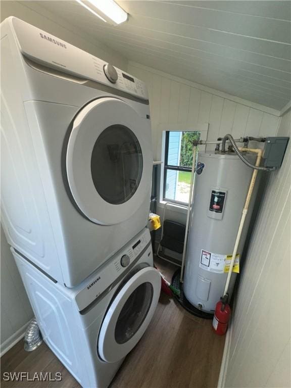 3475 Edgewood Ave, Fort Myers, FL 33916 - laundry room featuring stacked washer and dryer, dark hardwood / wood-style floors, and water heater