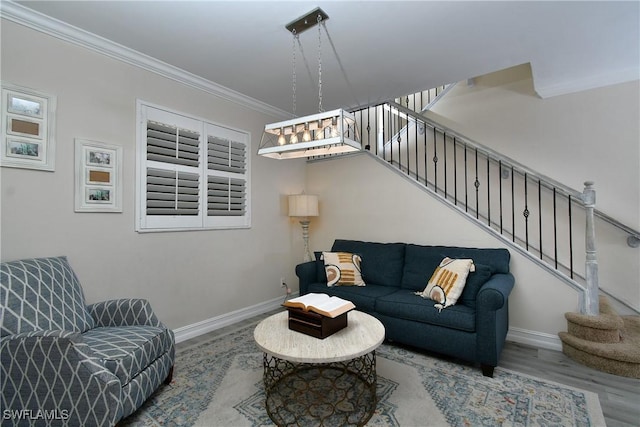 living room with ornamental molding and wood-type flooring