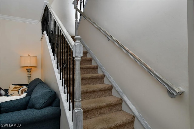 stairs featuring ornamental molding