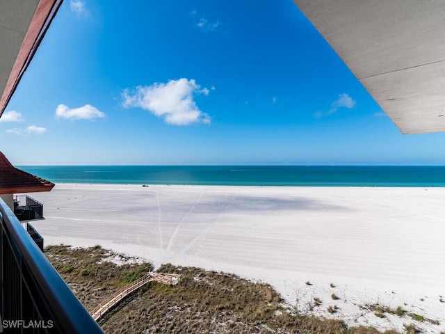 view of water feature with a beach view