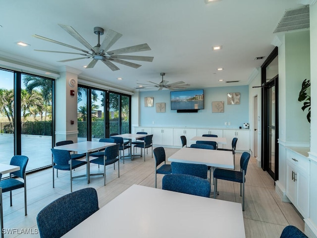 dining room featuring french doors and ornamental molding