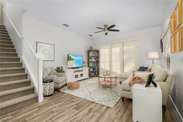 living room featuring ceiling fan