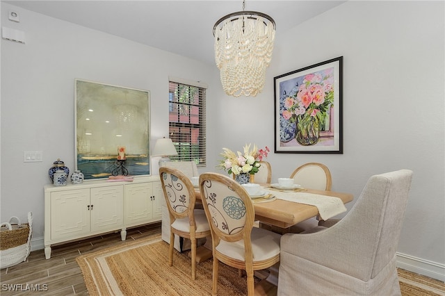 dining area featuring an inviting chandelier