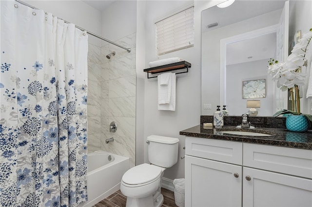 full bathroom featuring vanity, wood-type flooring, shower / bath combo, and toilet