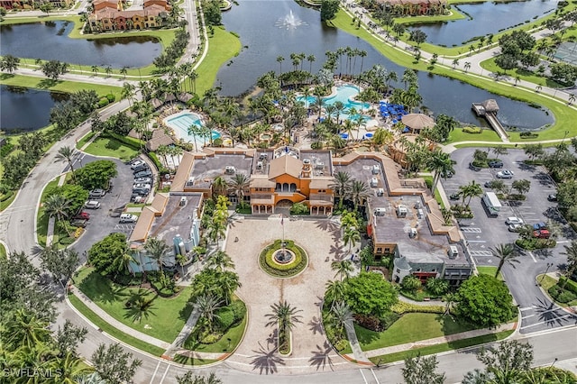 birds eye view of property with a water view