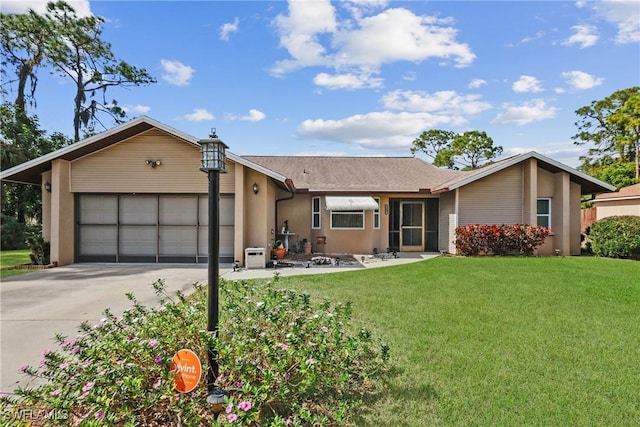 ranch-style home with a garage and a front lawn