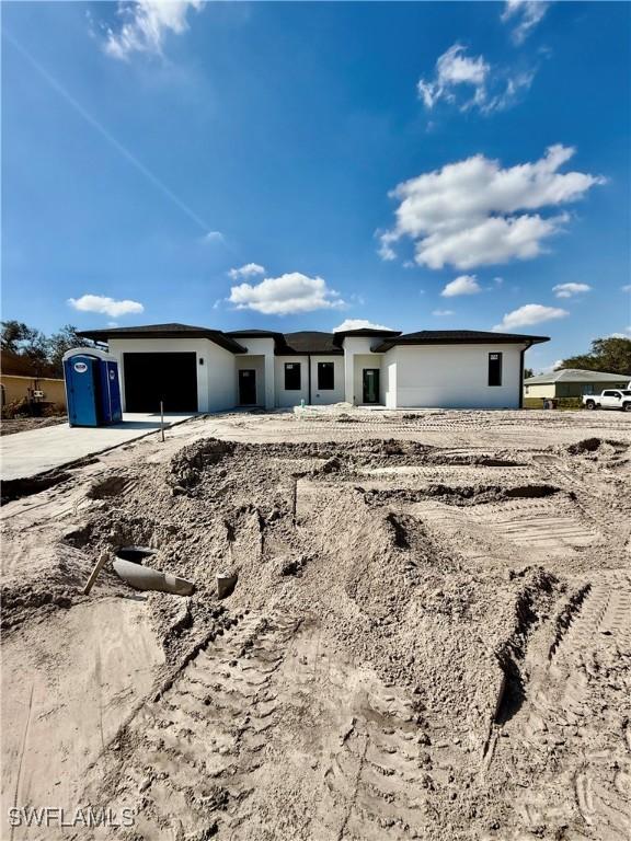 view of front of house with a garage