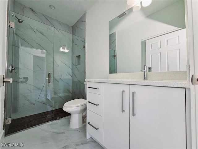 full bathroom with a marble finish shower, visible vents, toilet, marble finish floor, and vanity