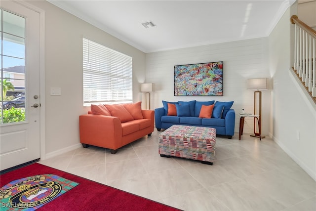 tiled living room with ornamental molding