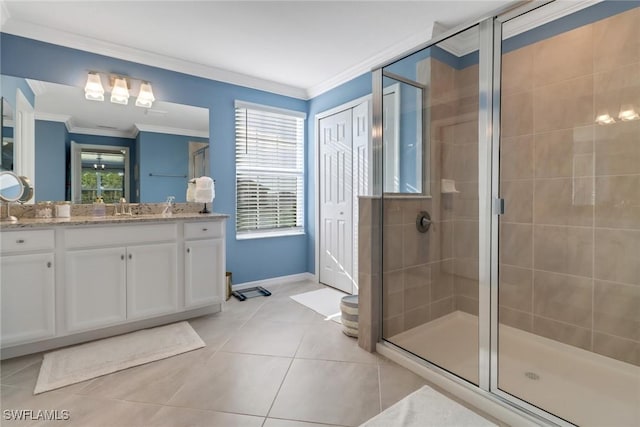 bathroom featuring crown molding, tile patterned flooring, vanity, and a shower with door