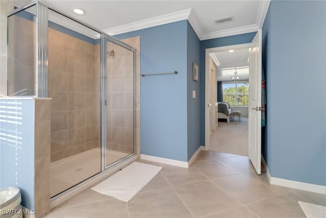 bathroom with crown molding, tile patterned floors, and walk in shower