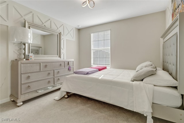 bedroom featuring carpet