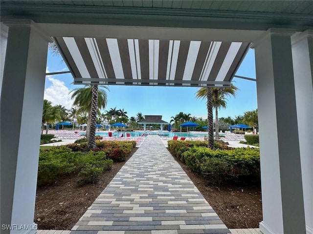 view of home's community with a swimming pool