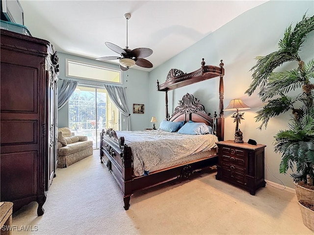 carpeted bedroom featuring access to outside and ceiling fan