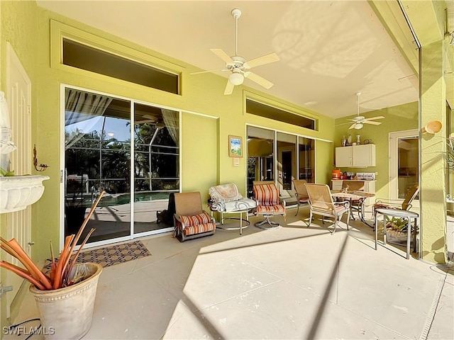 view of patio featuring ceiling fan