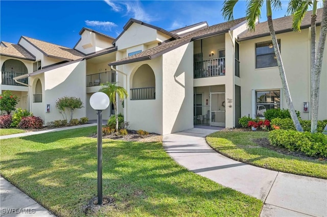 view of front of home with a front yard