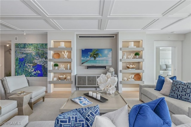 living room with coffered ceiling, built in features, and light wood-type flooring