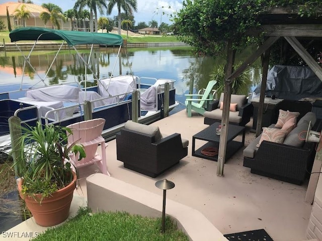 dock area with an outdoor living space and a water view