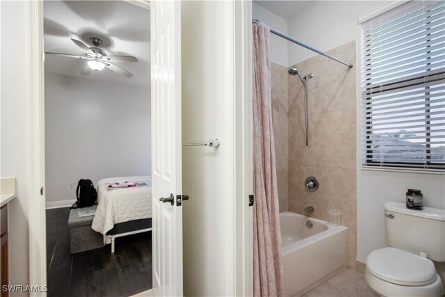 5222 N Ferrari Ave, Ave Maria, FL 34142 - full bathroom featuring toilet, ceiling fan, vanity, and shower / bathtub combination with curtain