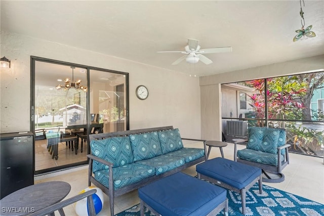 interior space featuring ceiling fan and an outdoor hangout area