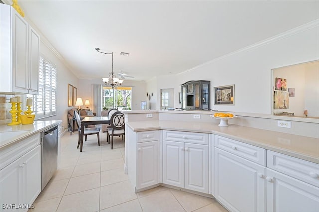 kitchen with white cabinetry, ornamental molding, dishwasher, and light tile patterned flooring