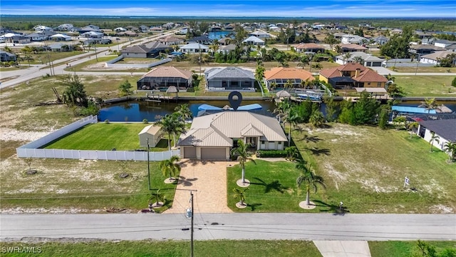 drone / aerial view featuring a water view