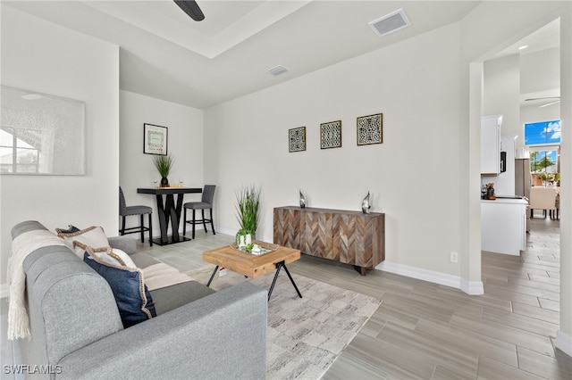 living room with ceiling fan