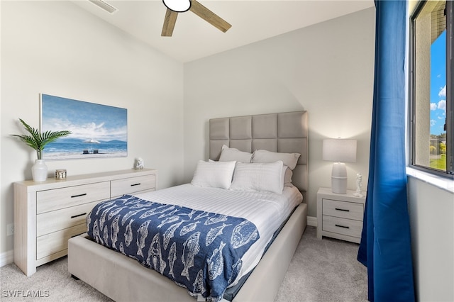 carpeted bedroom featuring ceiling fan