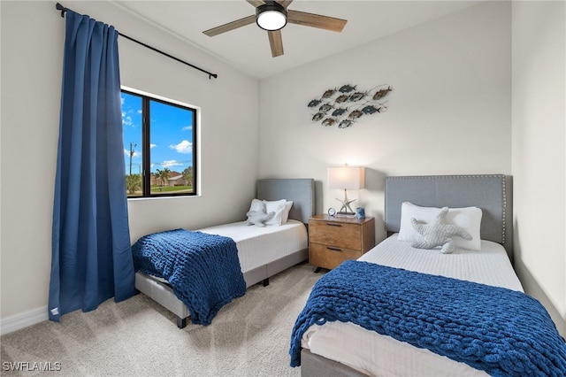 bedroom with ceiling fan and carpet