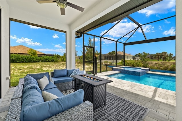 view of swimming pool with an outdoor living space with a fire pit, an in ground hot tub, a patio, and glass enclosure