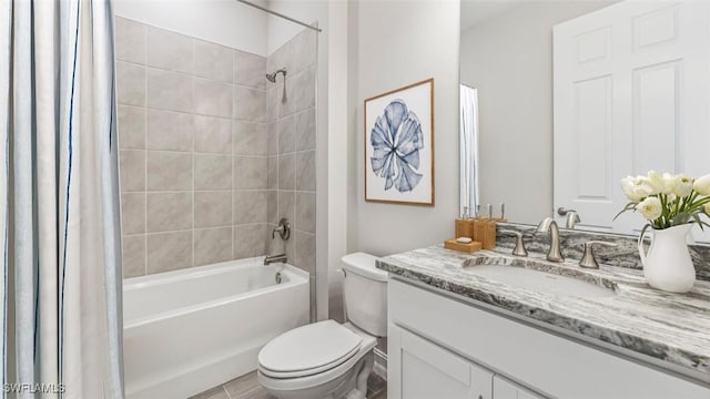 full bathroom with toilet, shower / bath combo, and vanity