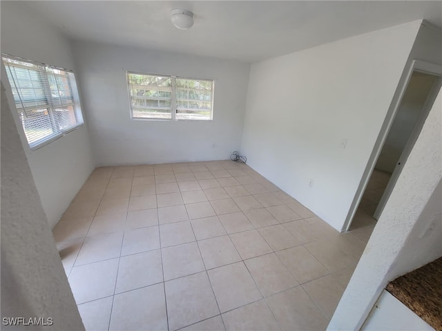 empty room featuring a wealth of natural light